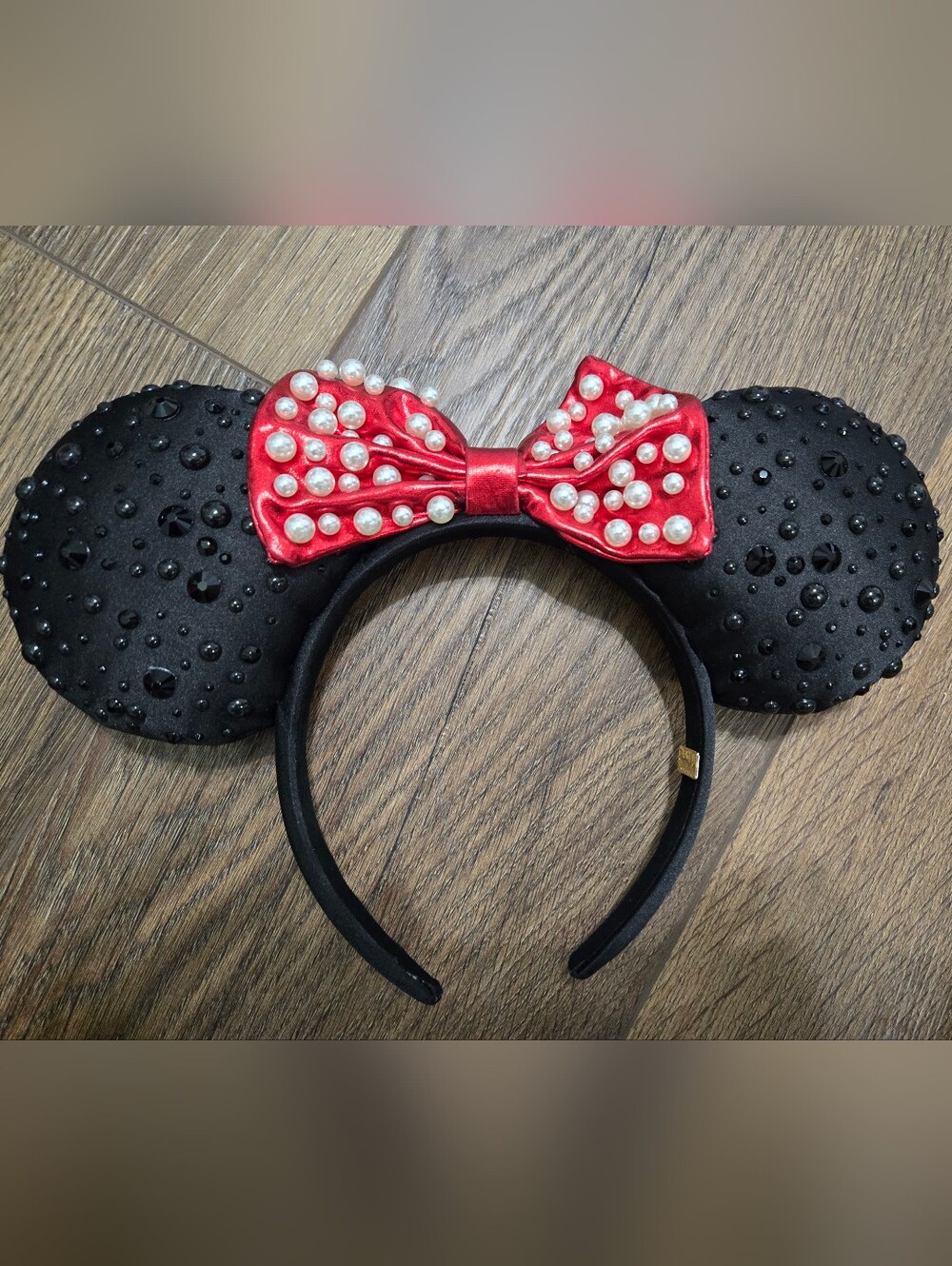 BaubleBar Black Pearl-Embellished Ear Headband with Red Pearl Bow